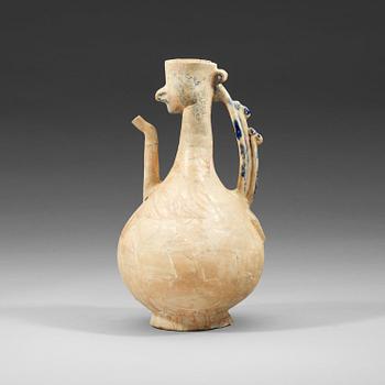 800. EWER. Pottery. Probably Kashan 12th-13th century, Iran. Height 27 cm.