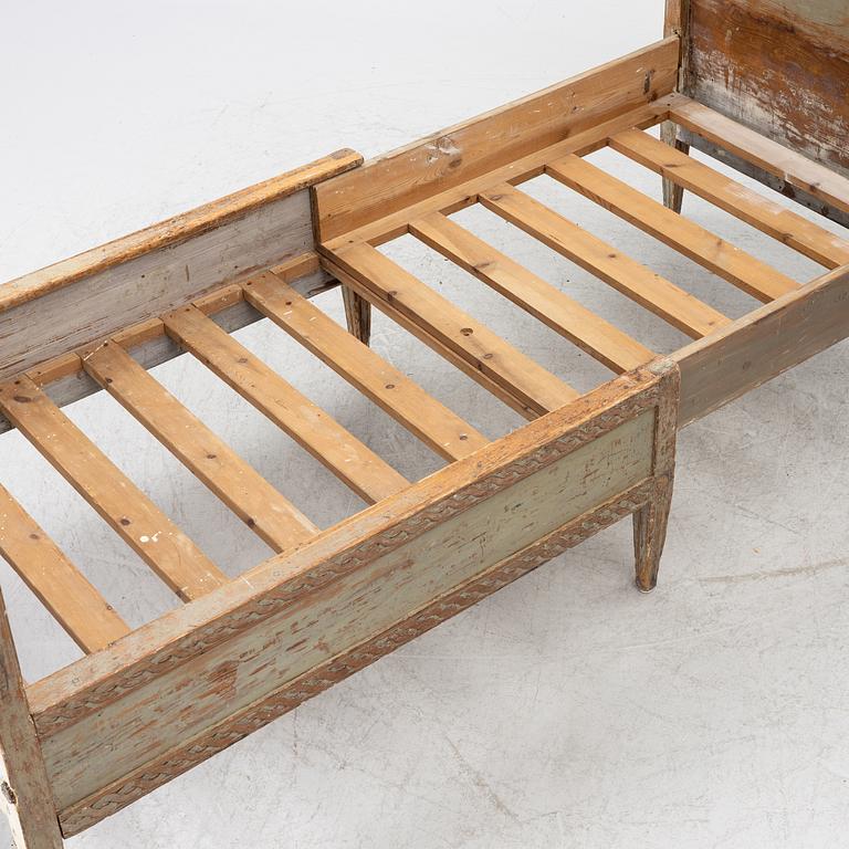 A Gustavian carved bedframe, late 18th century.