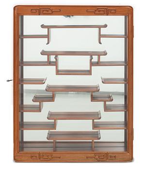 A Chinese Display Cabinet, second half of the 20th Century.