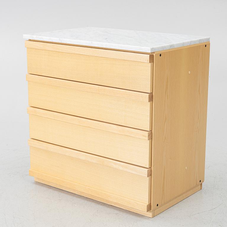 A contemporary chest of drawers.