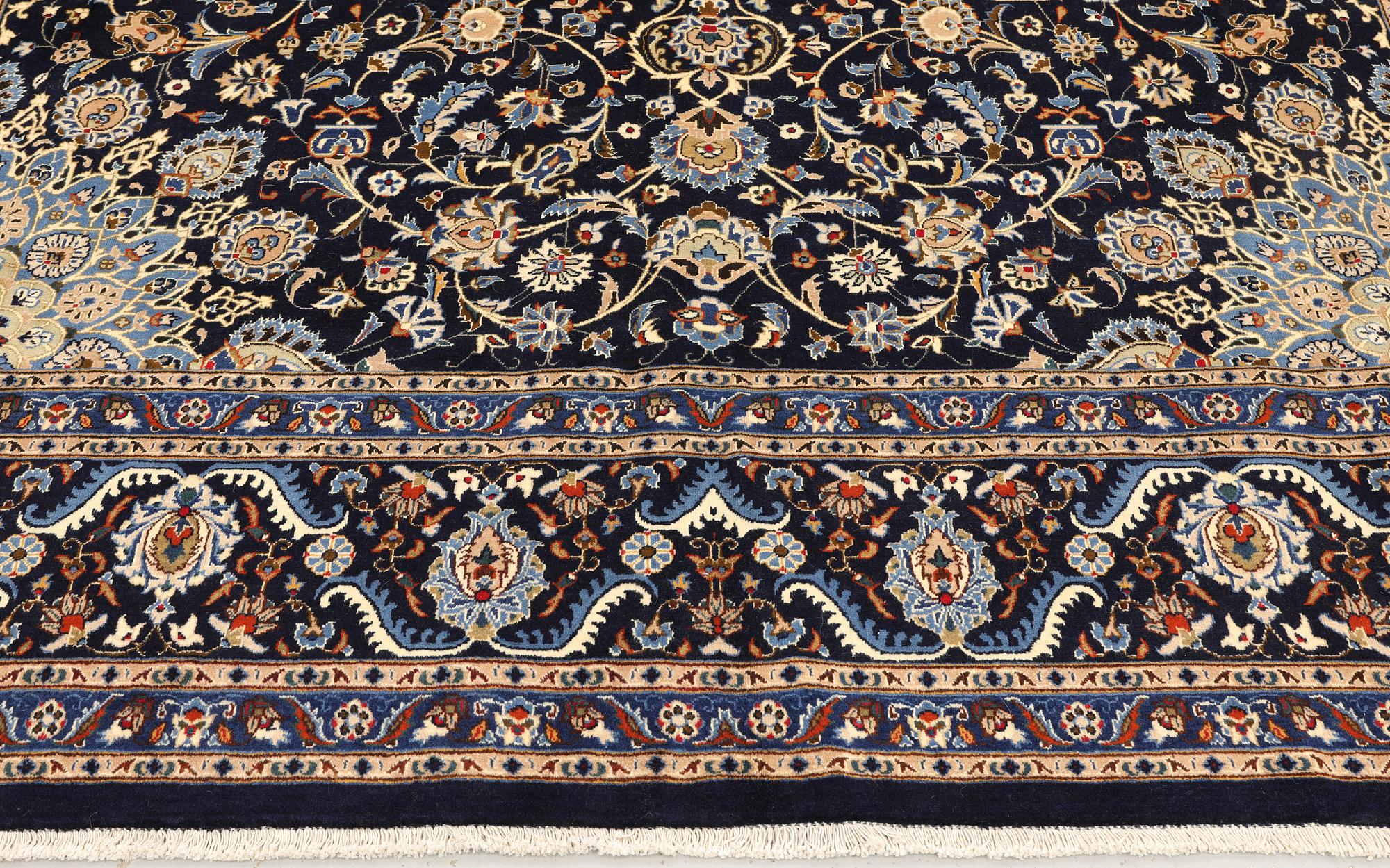 A Keshan carpet, approx. 400 x 295 cm.