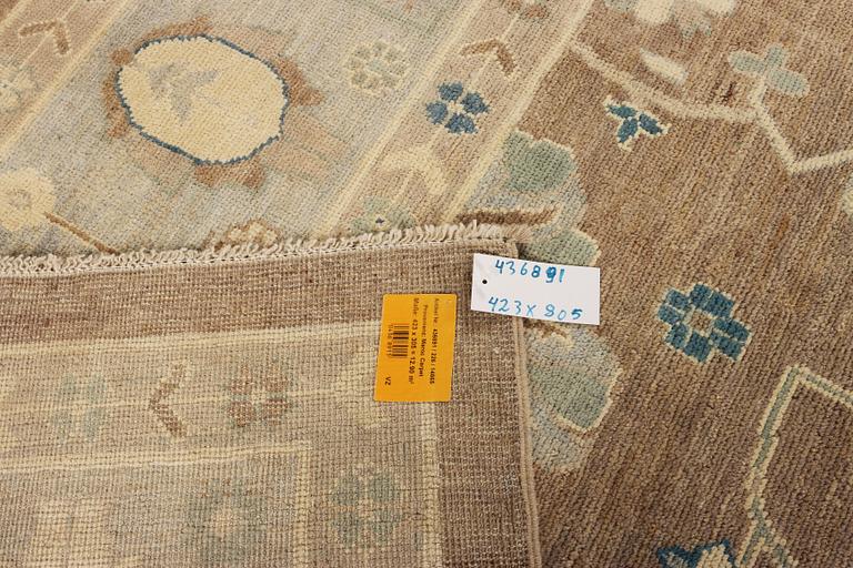 An Ushak design carpet, a. 423 x 305 cm.