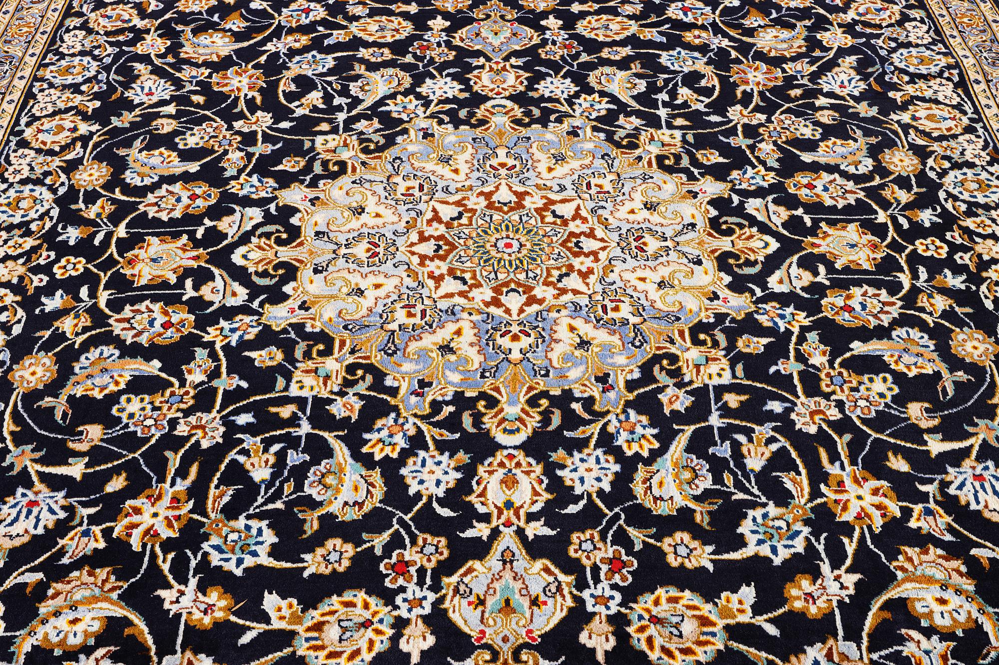 A Kashan carpet, c. 413 x 308 cm.
