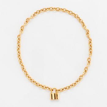 A Tiffany lock charm pendant necklace "1837" in 18K gold.