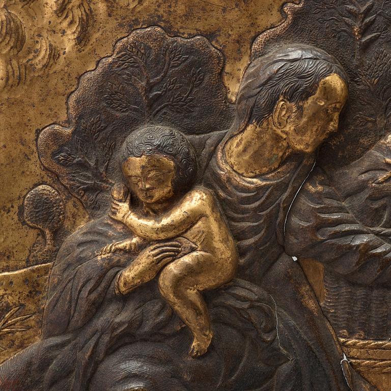A baroque gilt copper alloy relief of Mary, Elisabeth, Jesus and John in a landscape, probably India, 17th Century.