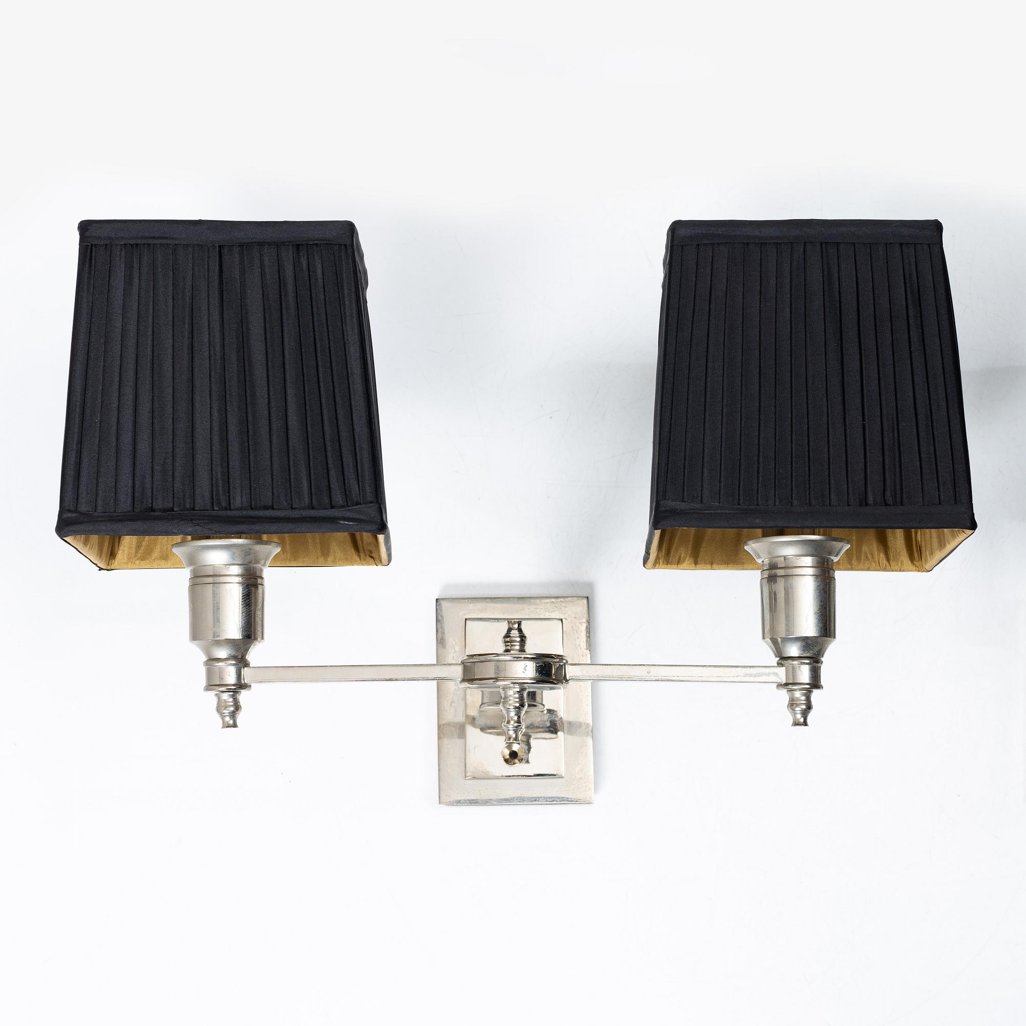 Two wall lamps from Eichholtz.