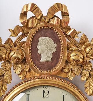 A late Gustavian giltwood cartel clock by J. Nyberg (master in Stockholm 1787-1801).