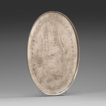 1345. A pewter tray with incised portrait of the Tang poet Li Bai (701-762), late Qing dynasty (1644-1912).