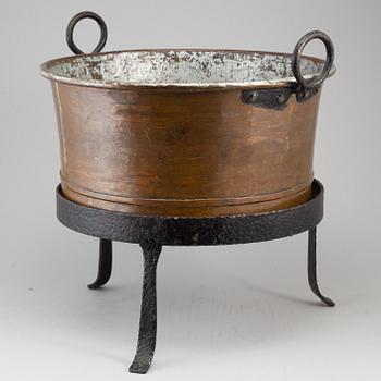 A 19th century copper cauldron.