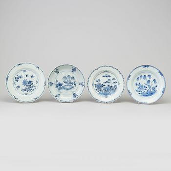 A set of four odd blue and white plates, Qing dynasty, Qianlong (1736-95).