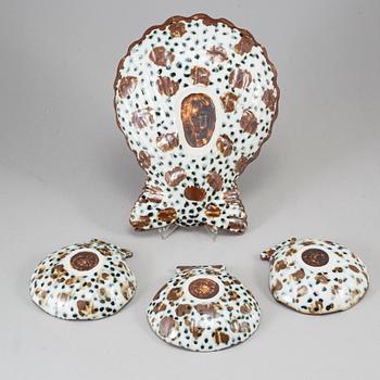 GUNNAR NYLUND, four stoneware oyster dishes, Rörstrand.