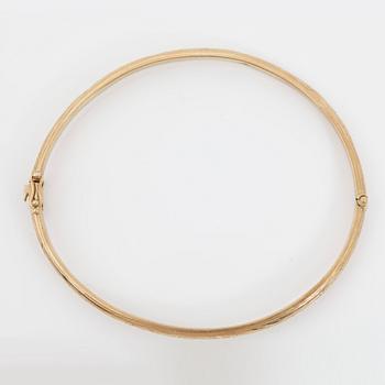 ARMRING, guld 18k, Stockholm 1900-tal. Vikt ca 6 gram.