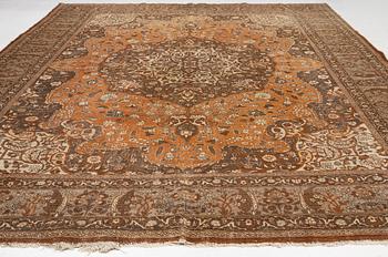 An antique Tabriz carpet, Northwest Persia, 453 x 310 cm.