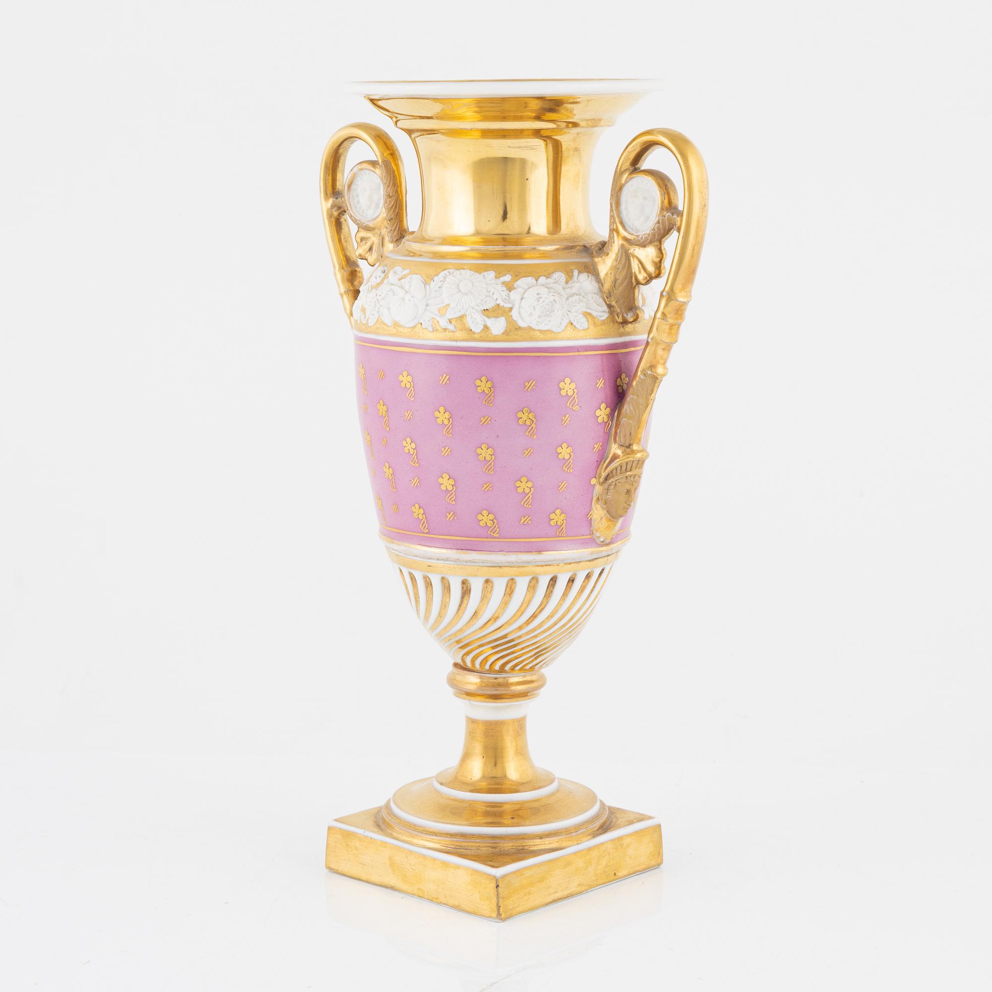 A gilt Empire porcelain vase, 19th Century.