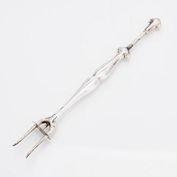 A set of six vodka cups, five napkin rings, a champagne whisk, and a tong, silver, Turku and Hämeenlinna, 1938, 1970.