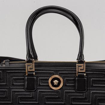Versace, a black quilted leather handbag.