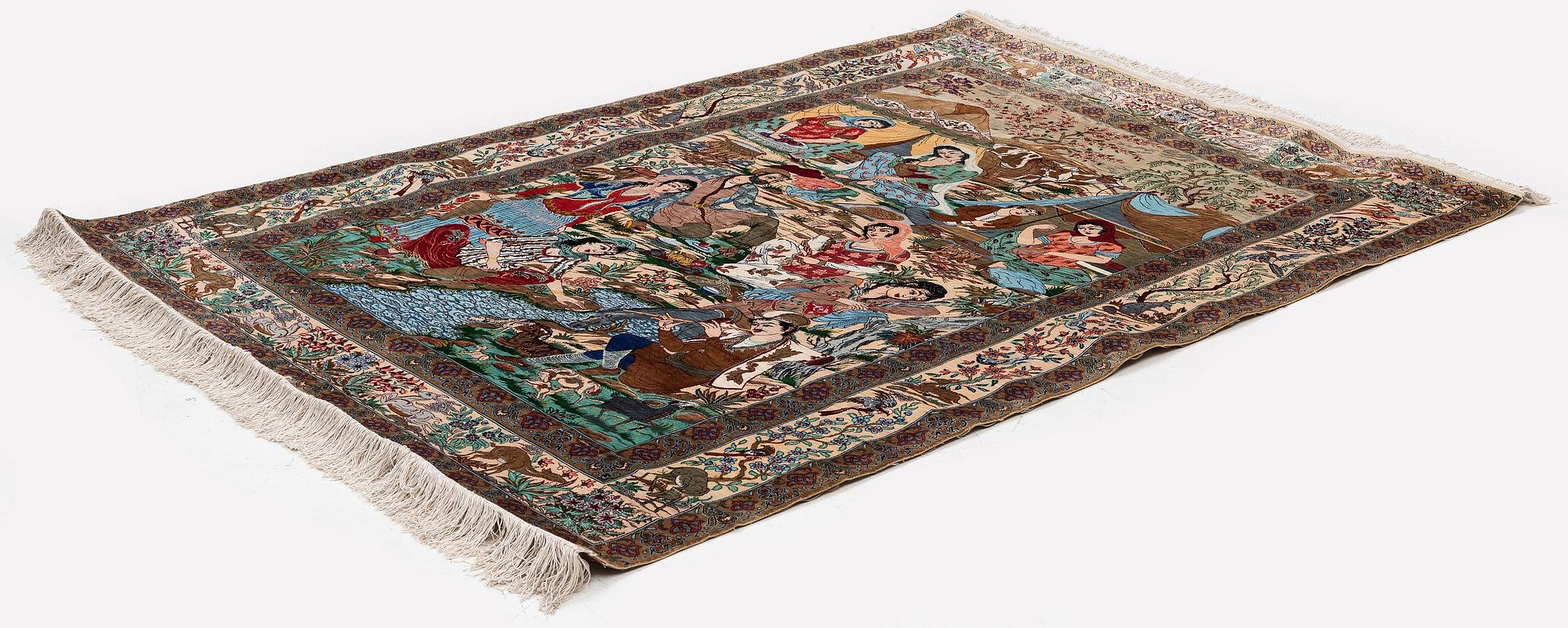 A silk Qum rug, Central Persia, signed, c. 135 x 208 cm.