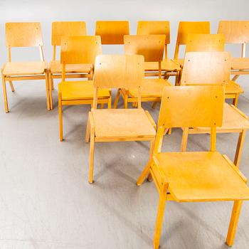 A set of 12 beech stackable chairs mid 1900s.