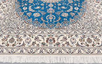A carpet, Nain part silk s.k 6LAA , 256 x 205 cm.