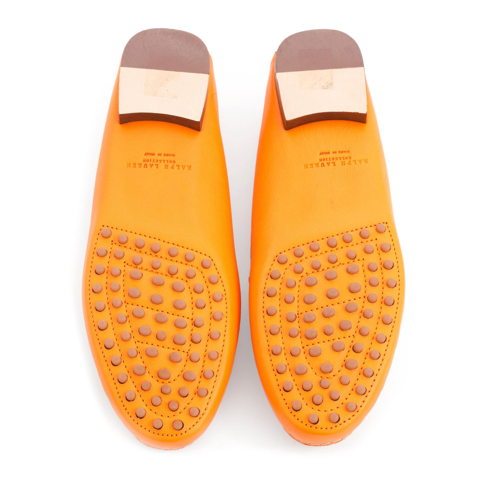 RALPH LAUREN, a pair of orange leather loafers. Size US 8 1/2B.