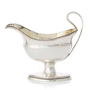 174. A Swedish Gustavian parcel-gilt silver cream-jug, mark of Petter Eneroth, Stockholm 1786.