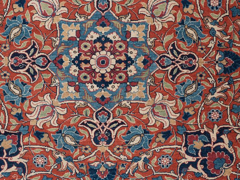 SEMI-ANTIQUE TEHERAN/ESFAHAN. 355,5 x 260,5 cm including a flat woven border along all four sides.