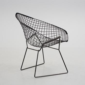 A "Diamond chair" by Harry Bertoia.