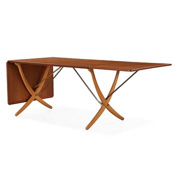 Hans J. Wegner, a teak and beech dining table by Andreas Tuck, Denmark 1950-60's.