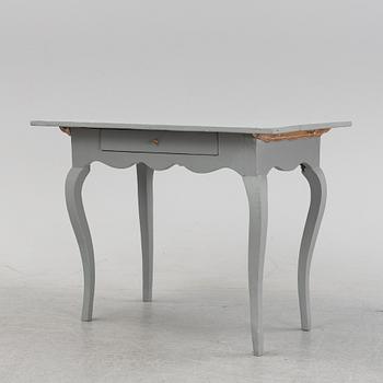 A painted rococo table, 18th Century.