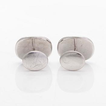 Patek Philippe, a pair of 18K whitegold 'Calatrava' cufflinks.