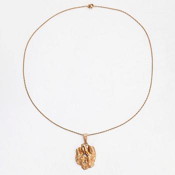 A 14K gold pendant, Sammon Sepät, Tampere 1970 with chain.
