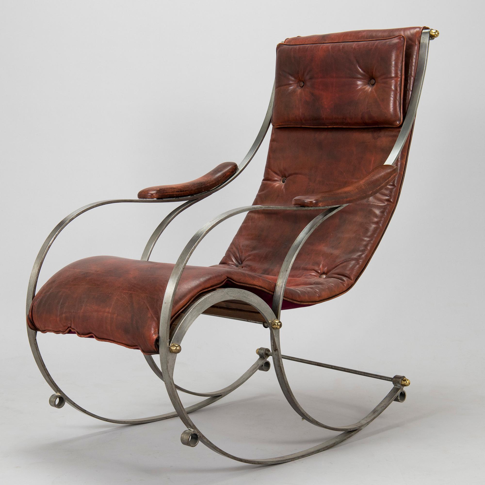 A 20th century steel frame rocking chair.