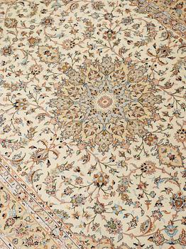 A silk rug from possibly from Kashan, 201 x 139 cm.