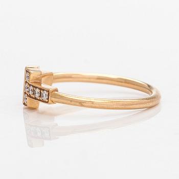 Tiffany & Co, an 18K gold 'T-wire' ring with diamonds.