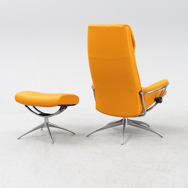 A 'London' stressless easy chair with foot stool, Norway.