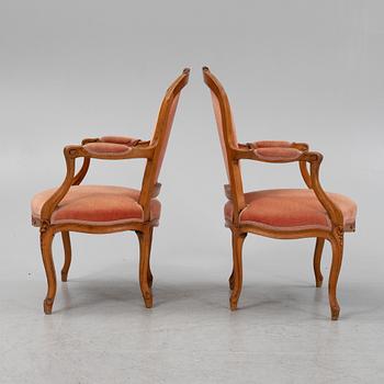 A pair of Louis XVI beechwood armchairs, 18th Century.