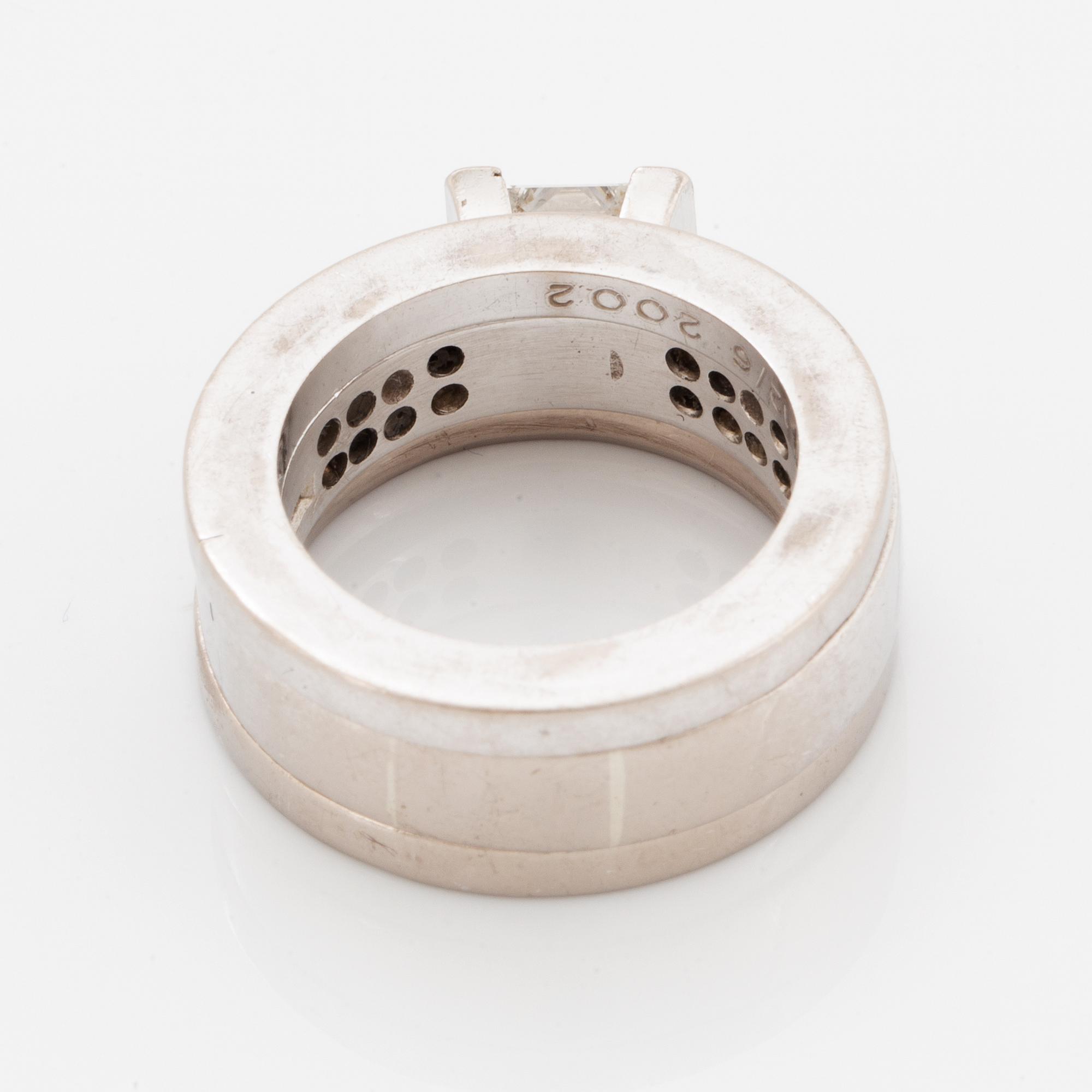 Rolf Karlsson, Three rings, 18K white gold with princess-cut and brilliant-cut diamonds, and two band rings.