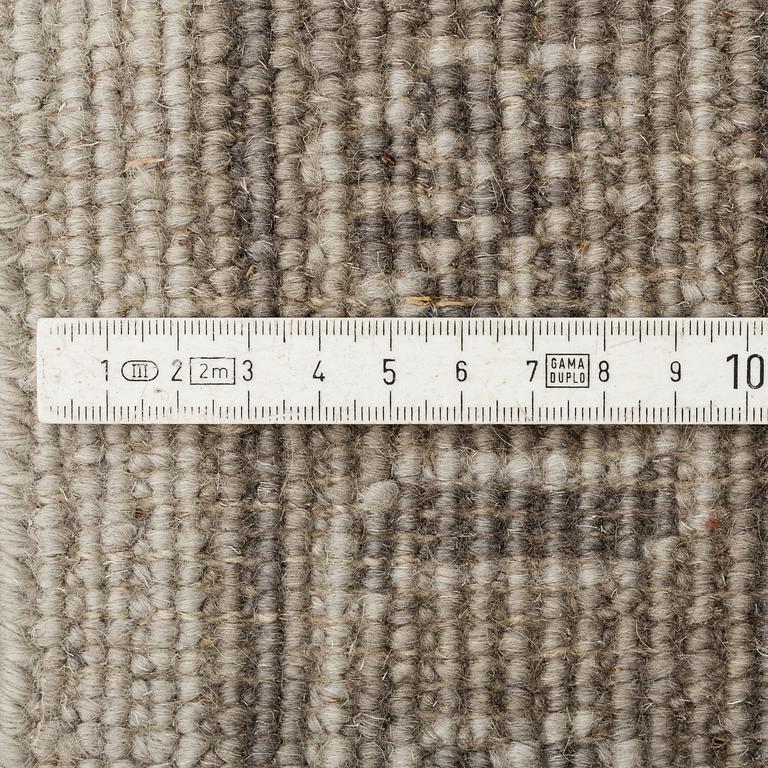 An oriental carpet, ca 364 x 273 cm.