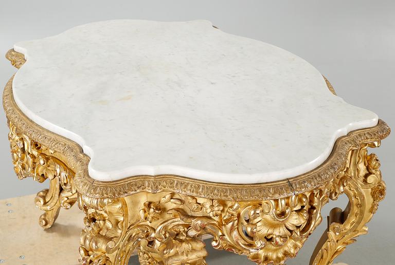 A Louis quinze style table from the later 19th century.