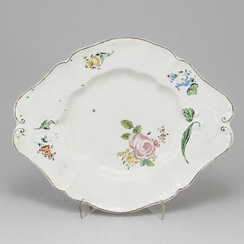 A German faience tureen stand marked B, 18th Century.