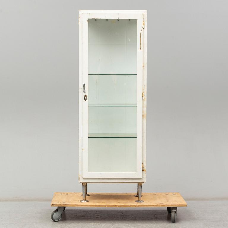 A metal doctor's cabinet, mid 20th century.