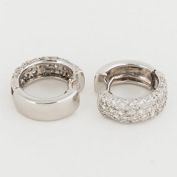 Platinum and brilliant-cut diamond earrings.