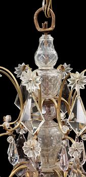 A Rococo 18th Century eight-light chandelier.