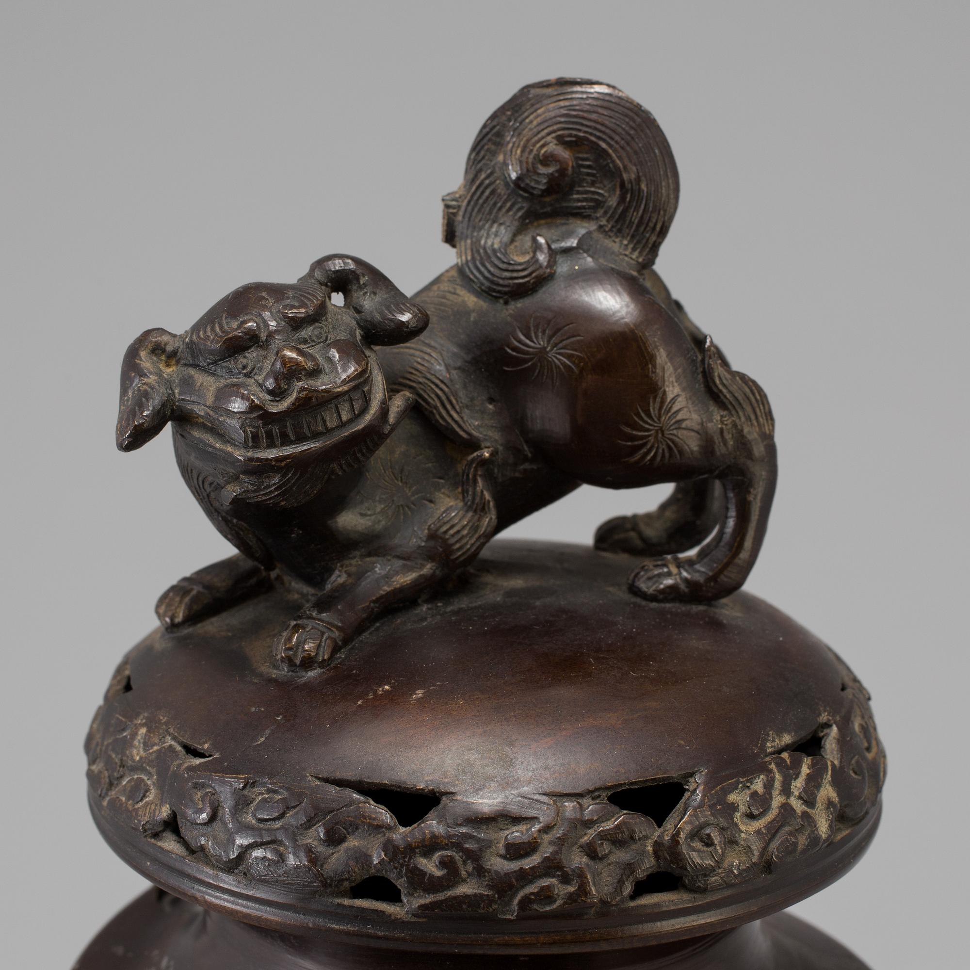 A Japanese bronze vase and cover, Meiji, late 19th century.