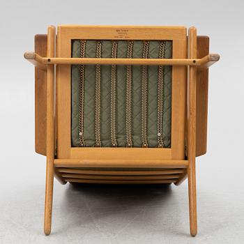 Hans J. Wegner, fåtölj med fotpall, "GE-290" Getama Gedsted, Danmark.