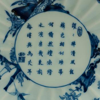 A pair of blue and white Transitional dishes, 17th Century, with Chenghua six character mark.