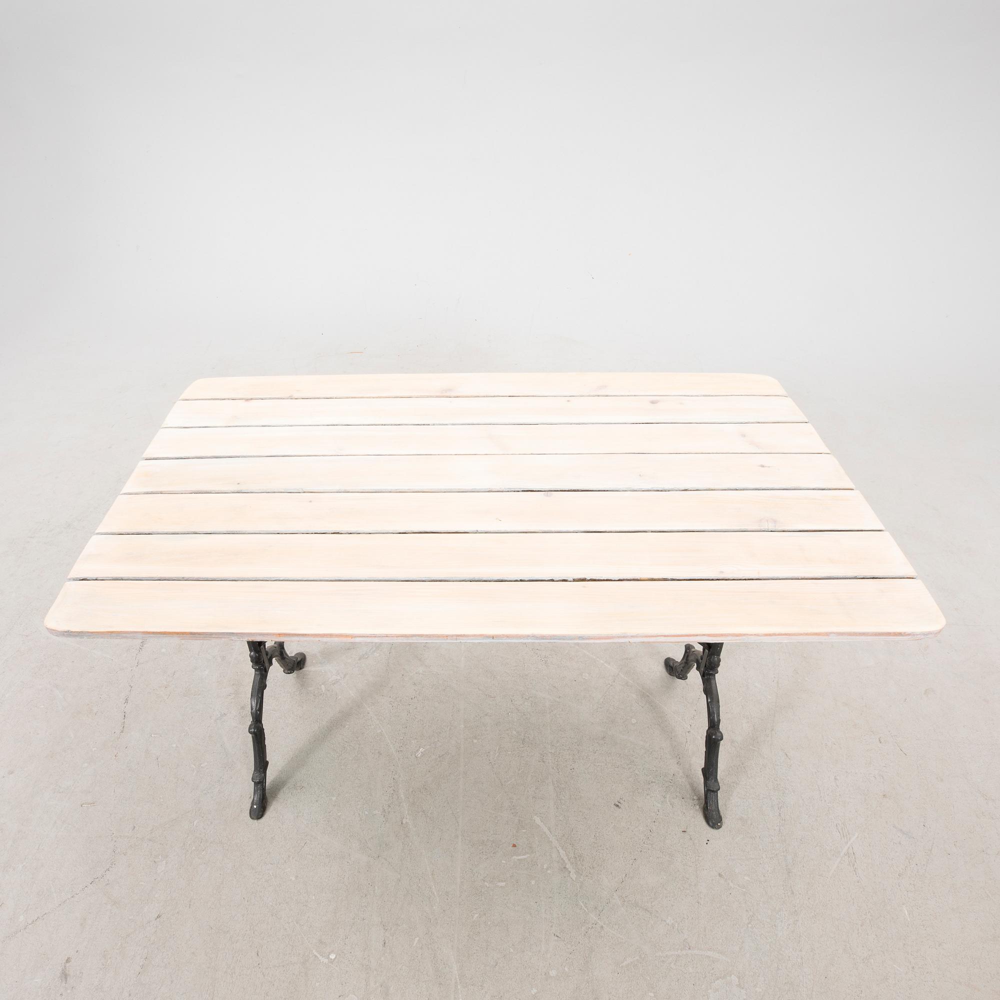 A Byarumns bruk aluminium and wood garden table later part of the 20th century.