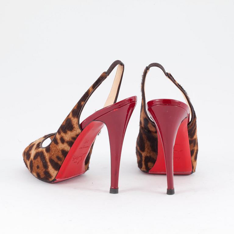 CHRISTIAN LOUBOUTIN, a pair of leopard printed peep-toe sandals. Size 38.