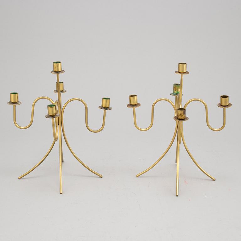 Gunnar Ander, a pair of five-light brass candelabra from Ystad Metall.