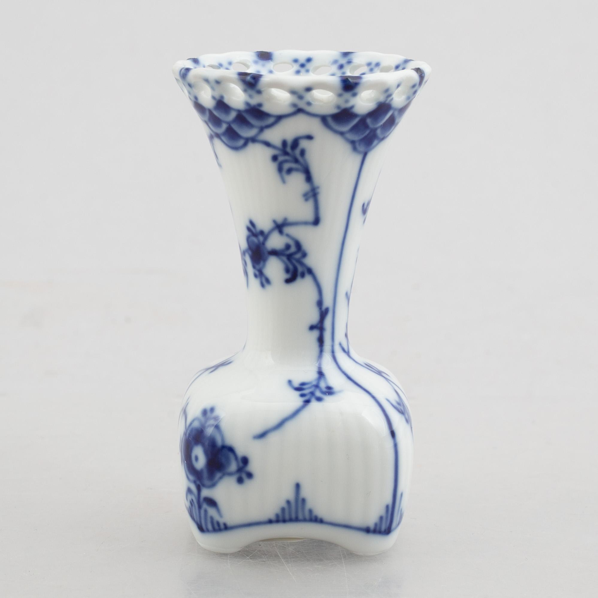 A group of two vases, two bowls and a candlestick, "Blue fluted full lace"/"Musselmalet", Royal Copenhagen.